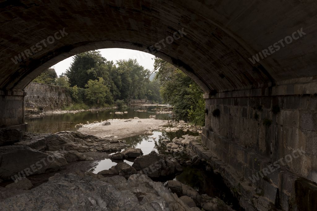 The view of the lower part of the Roman stone bridge in Cangas de Onis over the river in Spain