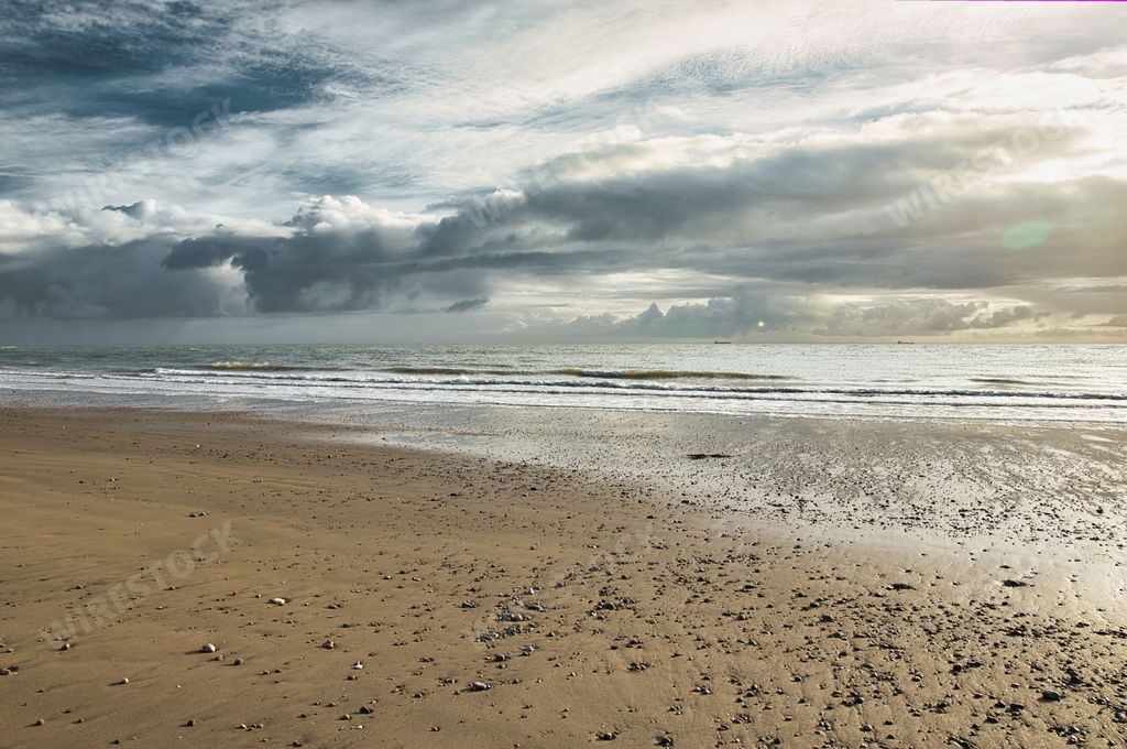 A beautiful seascape view with sand and calm water, Isle of wight