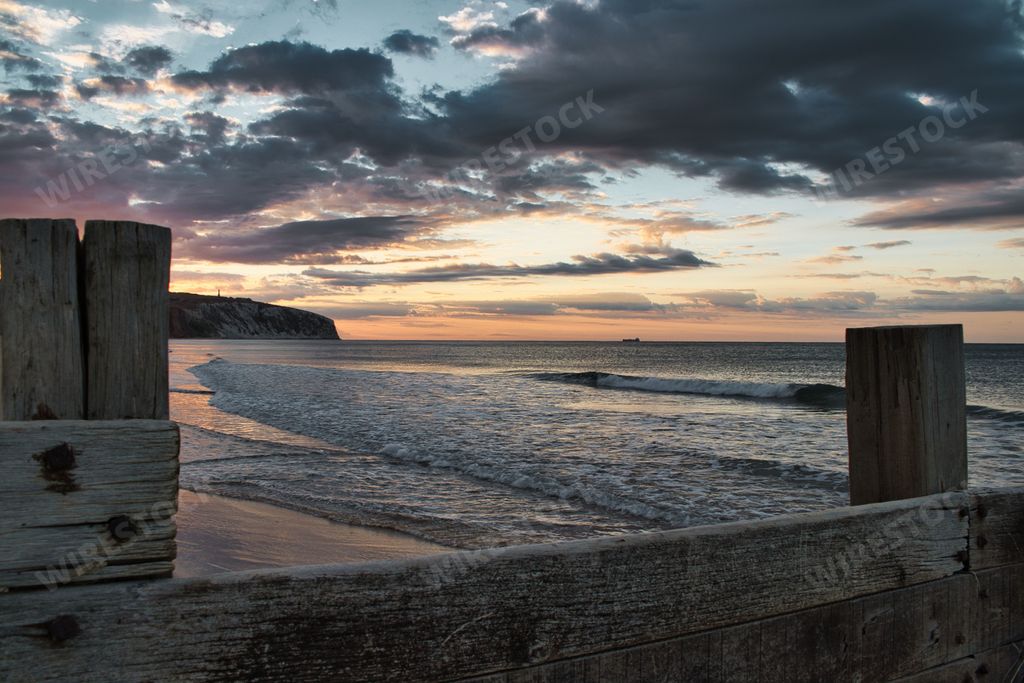 Dramatic cloudy sky over the scenic sea at sunset, Isle of Wight, England