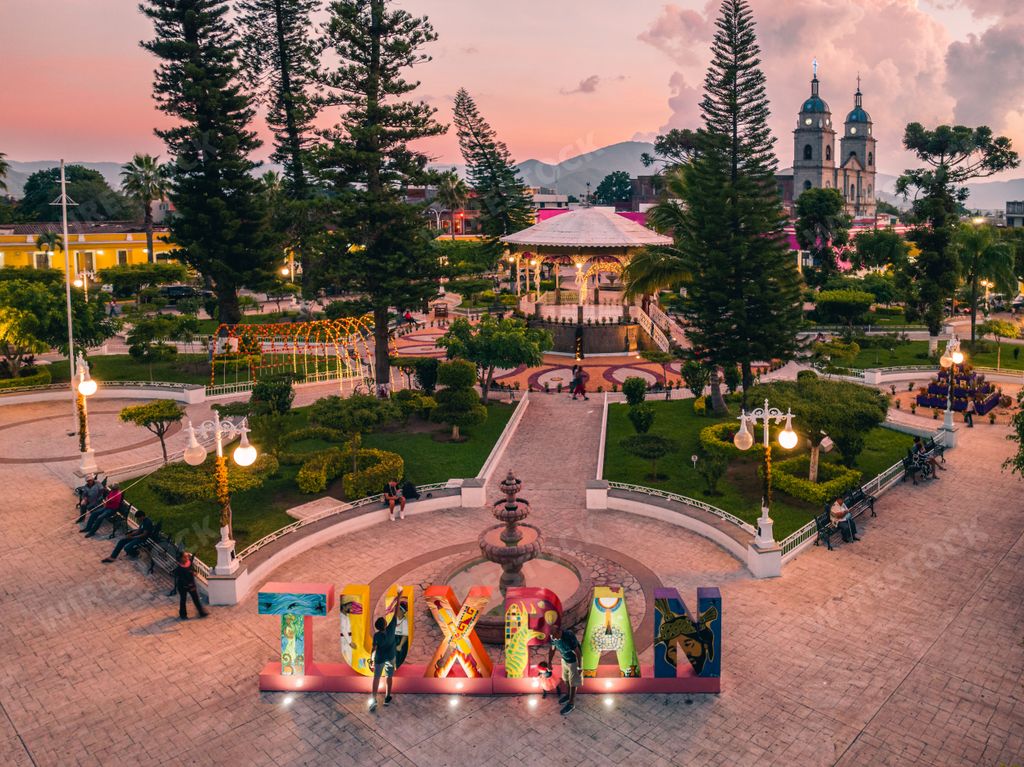 A drone view of the main square of Tuxpan Jalisco during sunset.