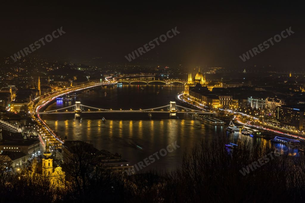 A bird's-eye view of the cityscape of Budapest in the night lights