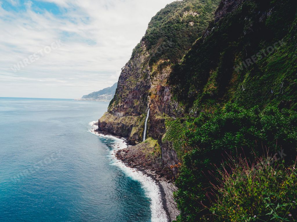 A beautiful coastal landscape with forested cliffs in Madeira, Portugal