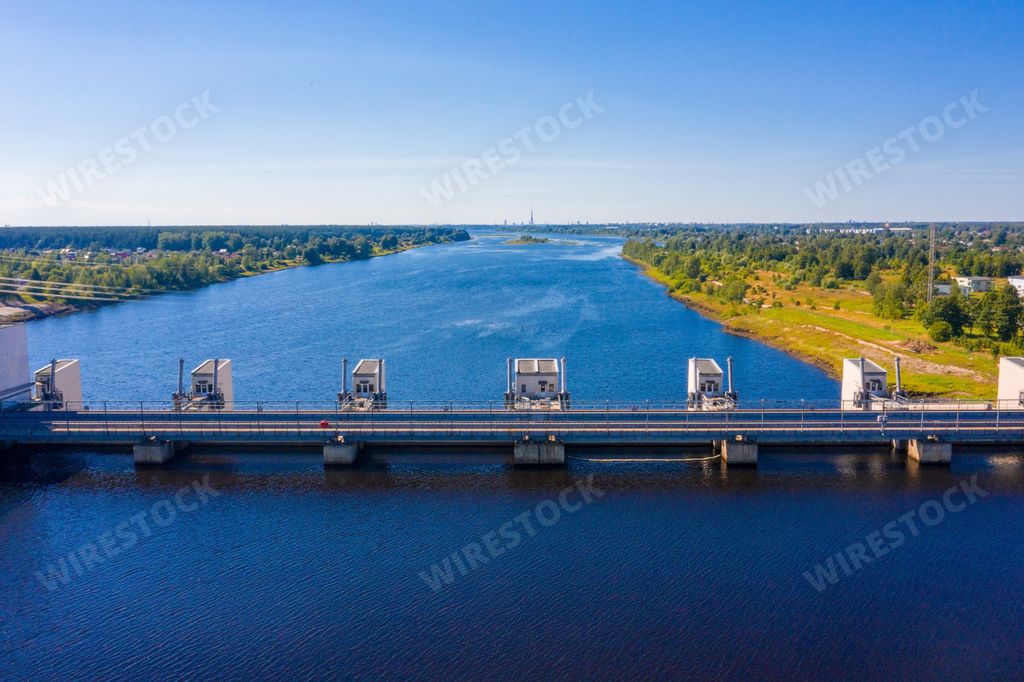 An aerial view of a huge reservoir and the Riga Hydroelectric Power Plant at the Daugava river in Latvia near city of Salaspils