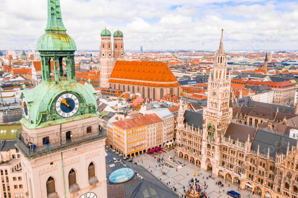 The St. Peter's Church on background of Munich, Germany