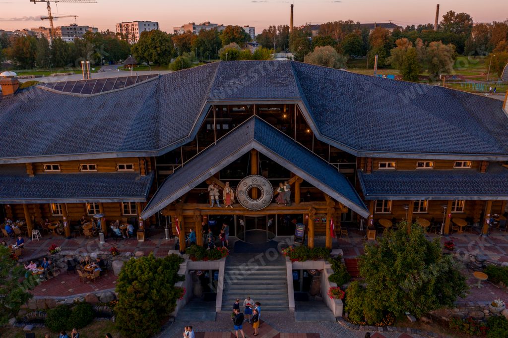 Riga, Latvia. July 24, 2020. Beautiful summer mood at the "Lido" restaurant with a huge installation decorated with led lamps at dusk.