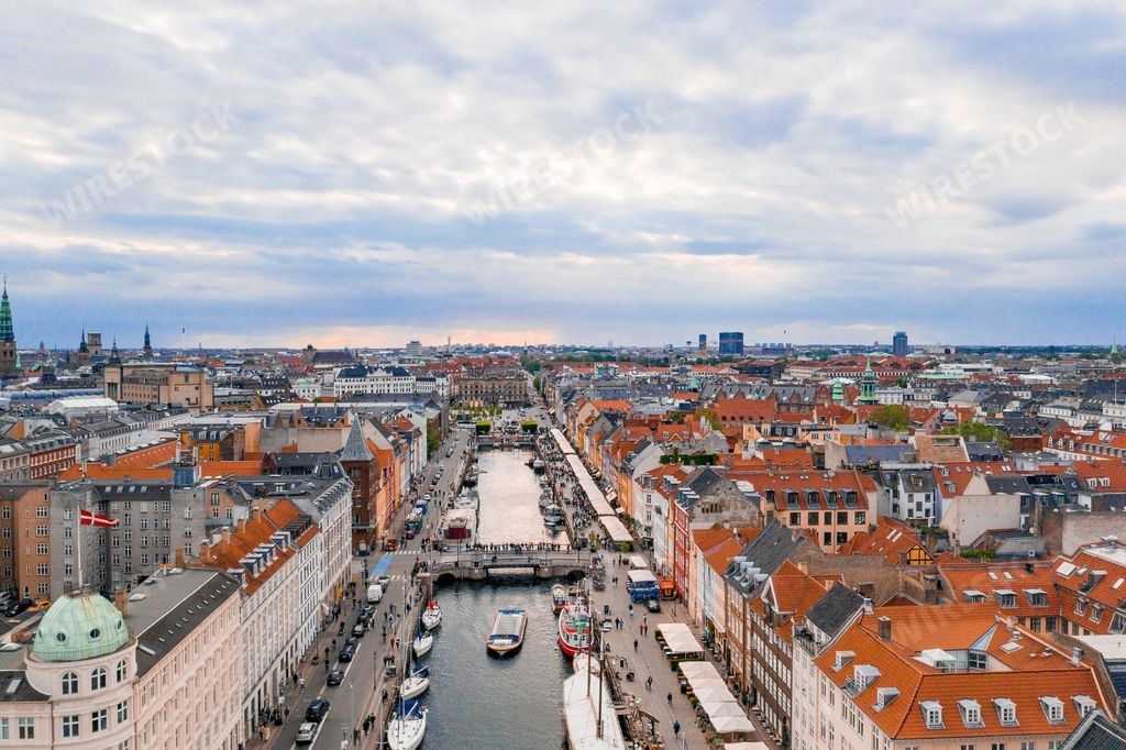 An aerial view of Tivoli Gardens amusement park and Nyhavn district with canals in Copenhagen, Denmark
