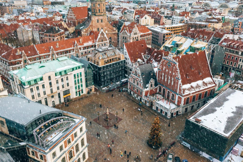 Beautiful city hall square with house of the blackheads and Saint Roland Statue in old town of Riga