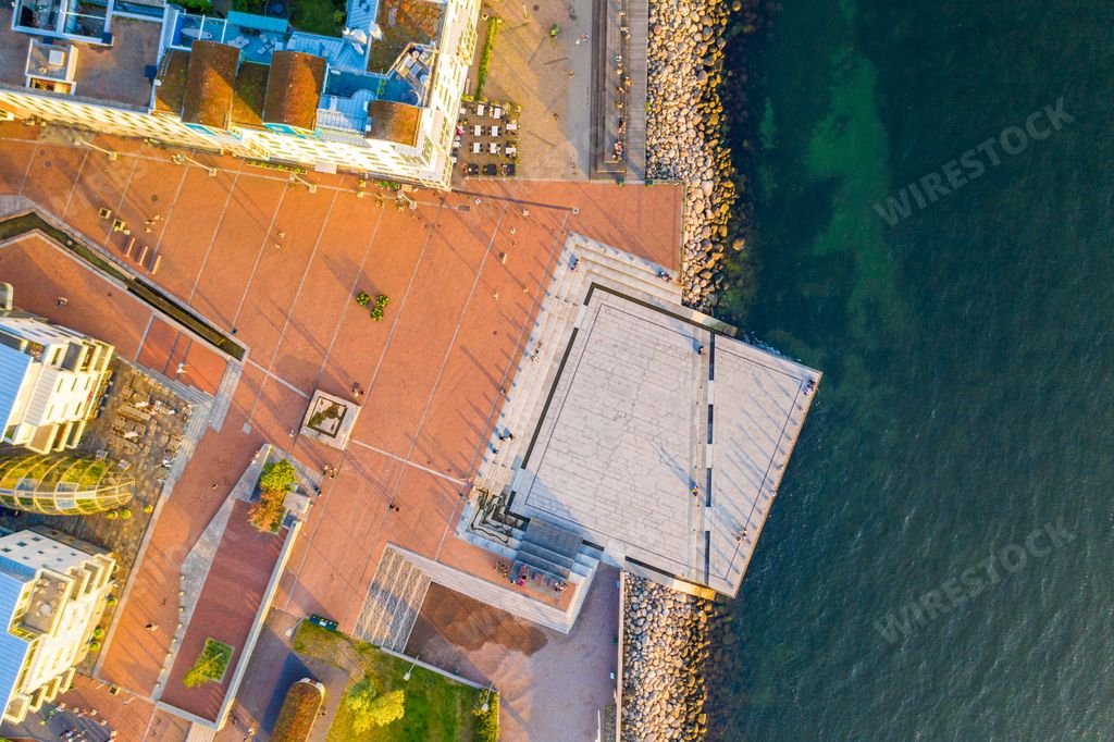 An aerial top view of The Western Harbour district in Malmo, Sweden, during sunset