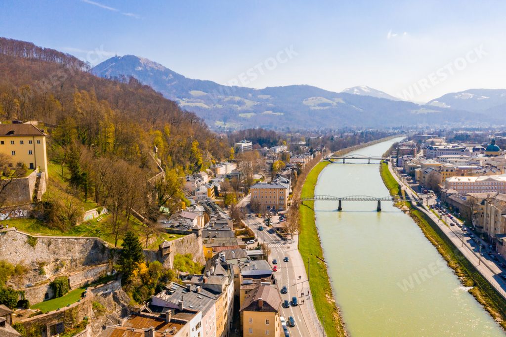 An aerial view of the Salzburg old town, cathedral and river Salzach across the city in Austria