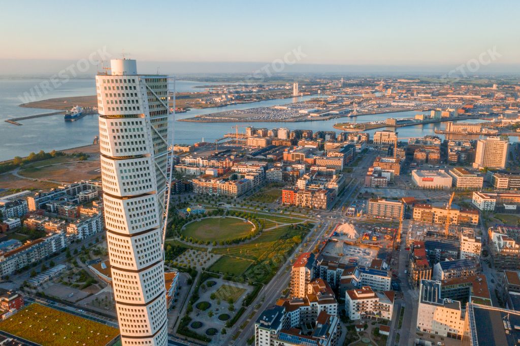 An aerial view of the Turning Torso skyscraper in Malmo, Sweden during a sunny day