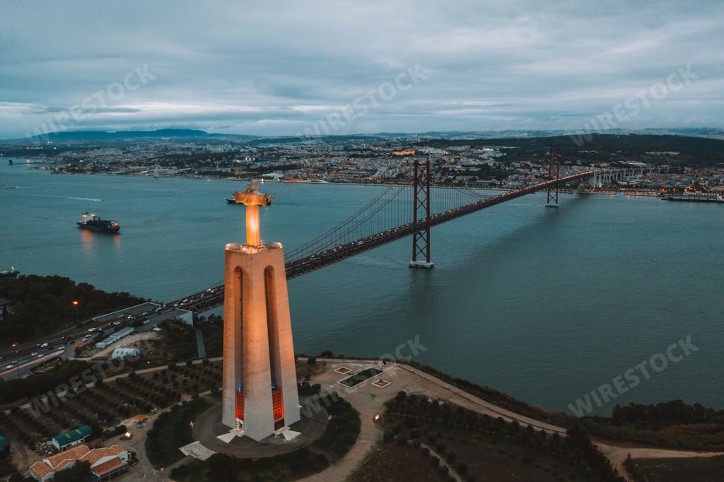 An aerial view of Cristo Rei Christ Statue in Lisbon in the evening time