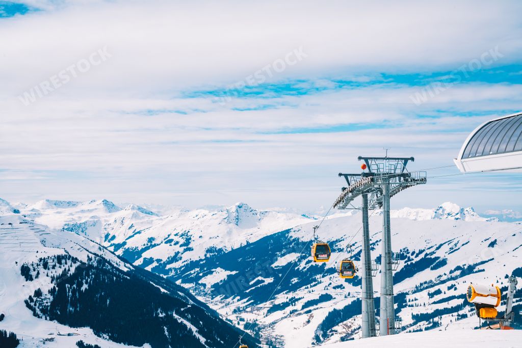 A beautiful shot of ski lifts and cable cars in Saalbach ski resort during winter time