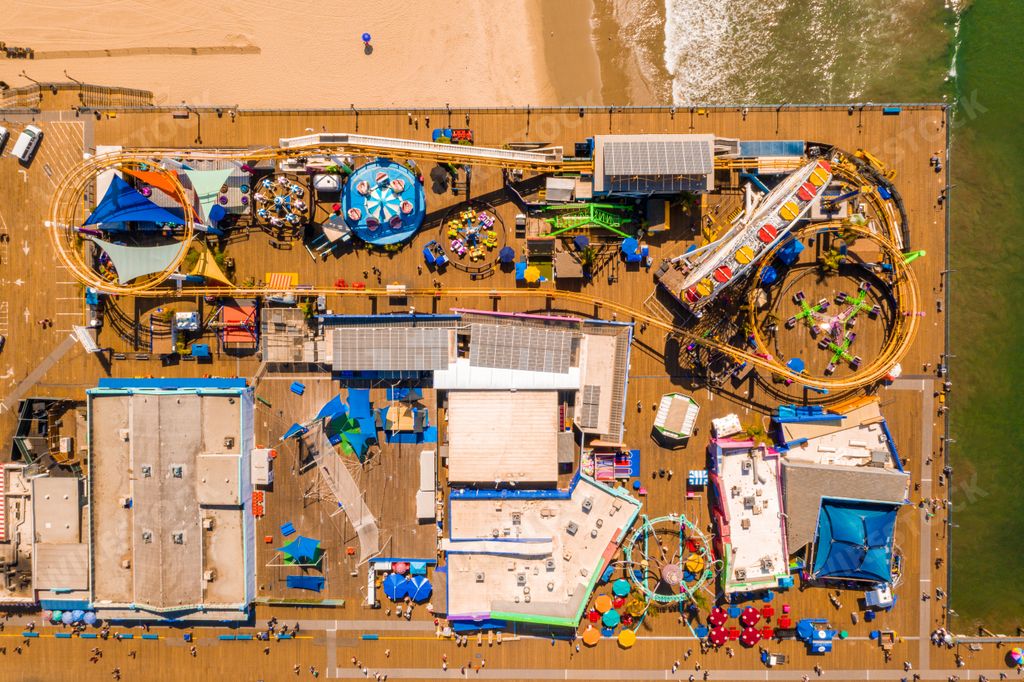 An aerial overhead shot of the Pacific Park in the Santa Monica Pier