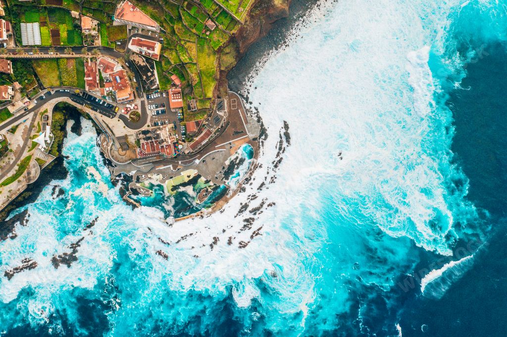 An aerial high angle shot of Porto Moniz coast near Madeira Island, Portugal