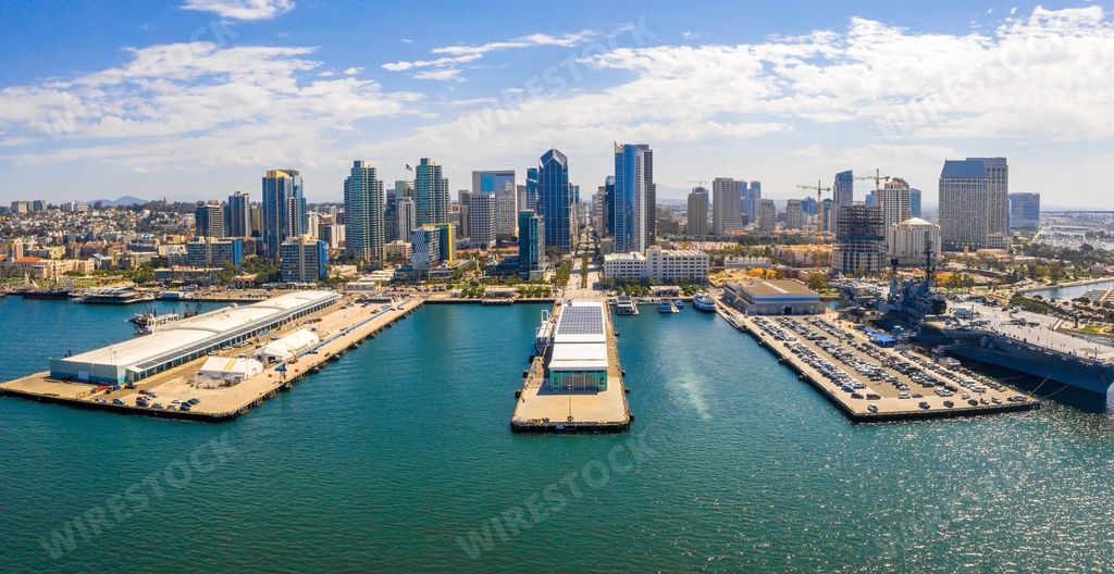An aerial view of the San Diego downtown with the harbor with many skyscrapers