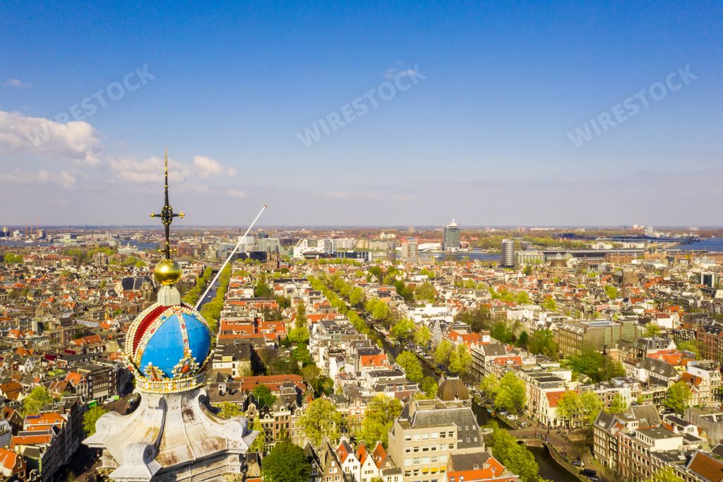 The top of the Amsterdam cathedral with the amazing aerial view of the city