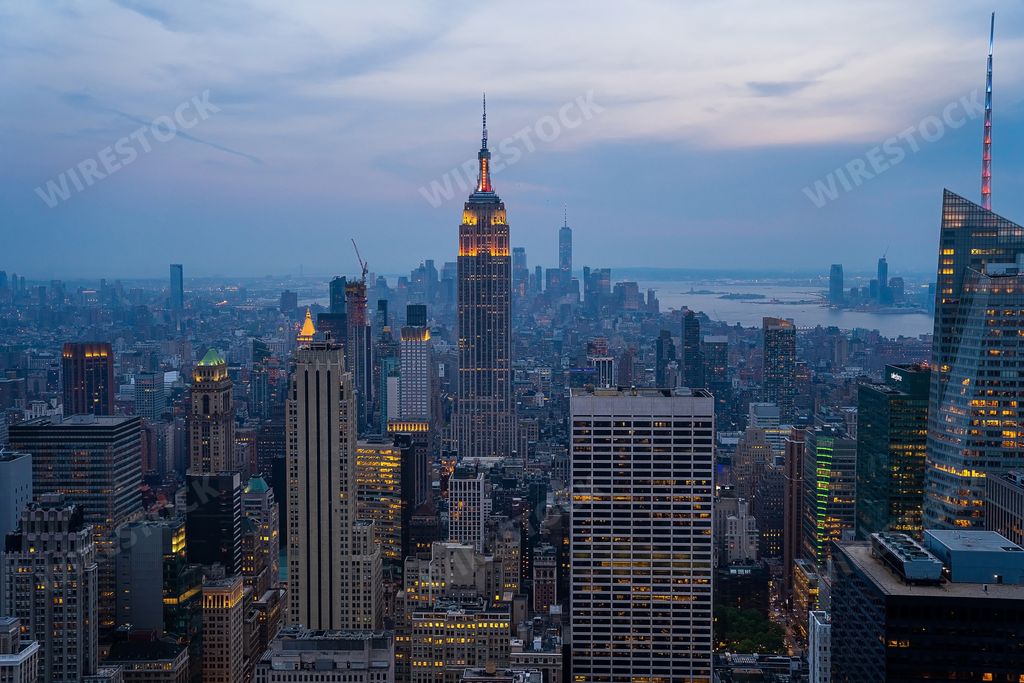 The New York City night skyline with cityscape and skyscrapers in Manhattan