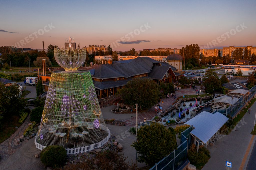 Riga, Latvia. July 24, 2020. Beautiful summer mood at the "Lido" restaurant with a huge installation decorated with led lamps at dusk.
