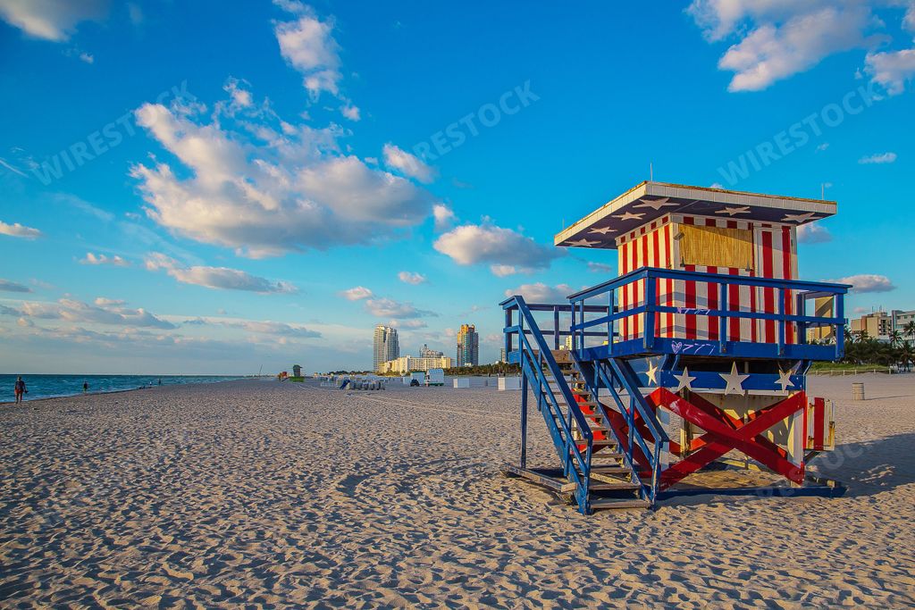 A lifeguard tower in South Beach, Miami with the colors of the American flag