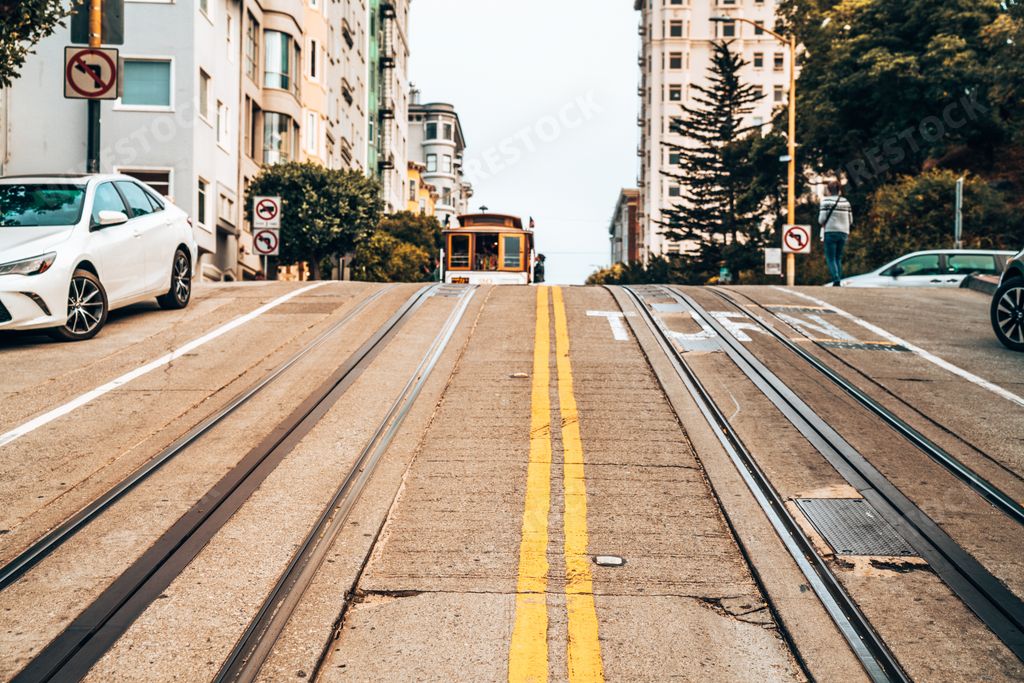 A road and traditional cable car in San Francisco