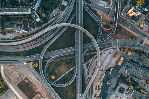 Aerial view of highways with overpass intersections Stock photo | Wirestock