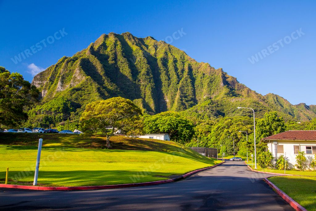 A beautiful view of the famous mountain landscape near the haiku stairs on a blue sky background