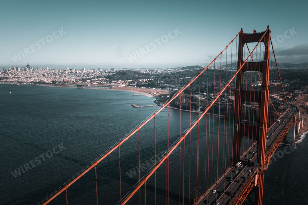 An aerial sunset view of the Golden Gate Bridge in San Francisco, California