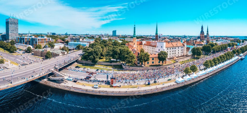 A panoramic shot of Riga during The Rimi Riga Marathon under the sunlight and a blue sky in Latvia