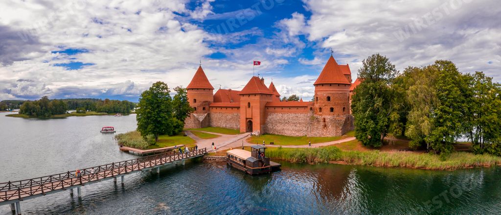 A panoramic shot of the Trakai Island Castle in the Galve lake surrounded by greenery in Lithuania