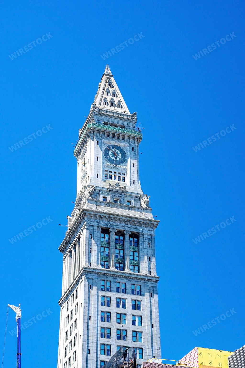 A vertical shot of the Custom House Tower in Boston