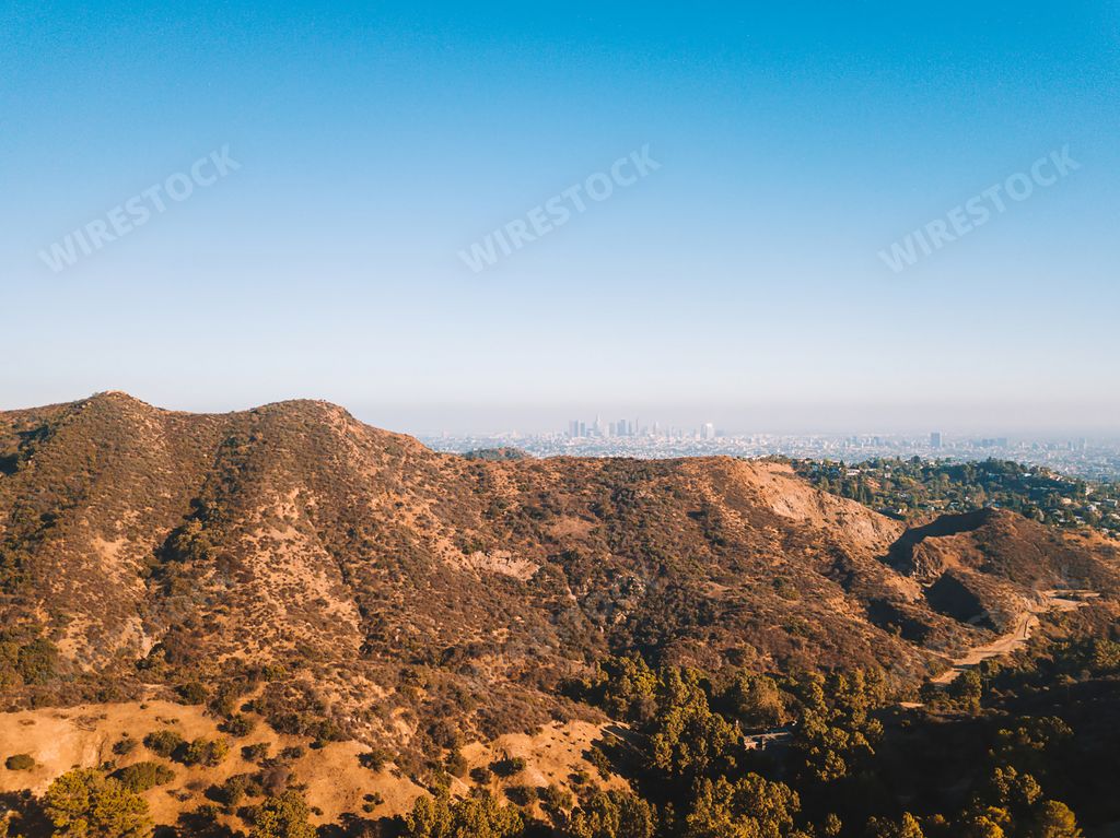A beautiful aerial view of Griffith Park and Los Angeles downtown