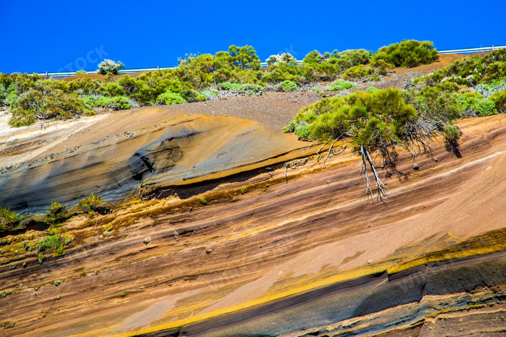 A beautiful and amazing layers of Tenerife geology on a blue sky background