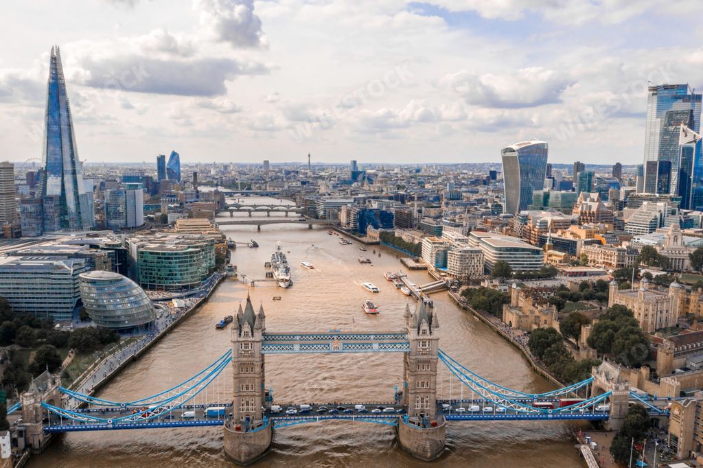 The capital of the UK, London and the Thames under a cloudy sky