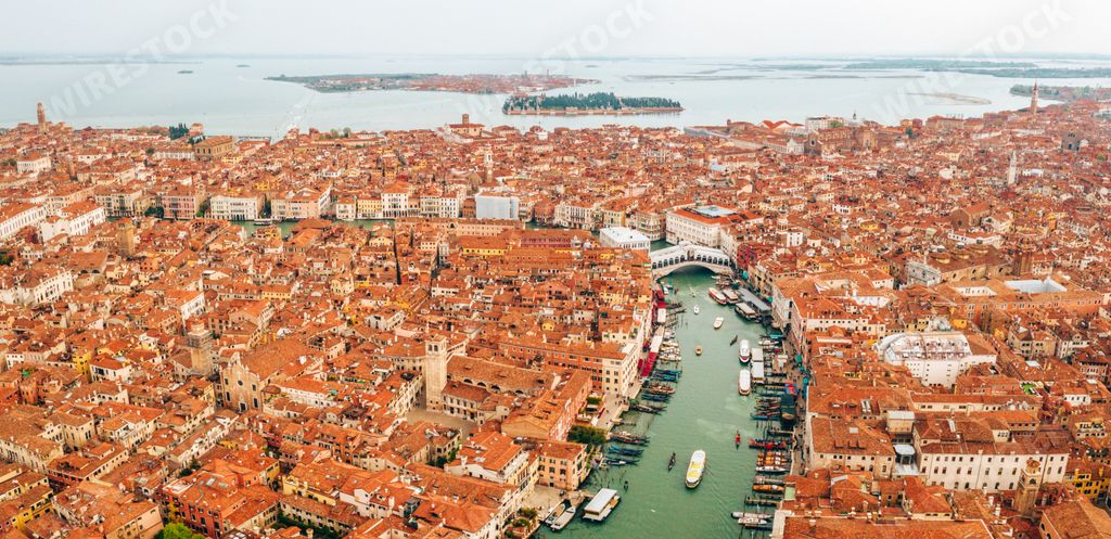 An aerial view of Venice with a canal in the center