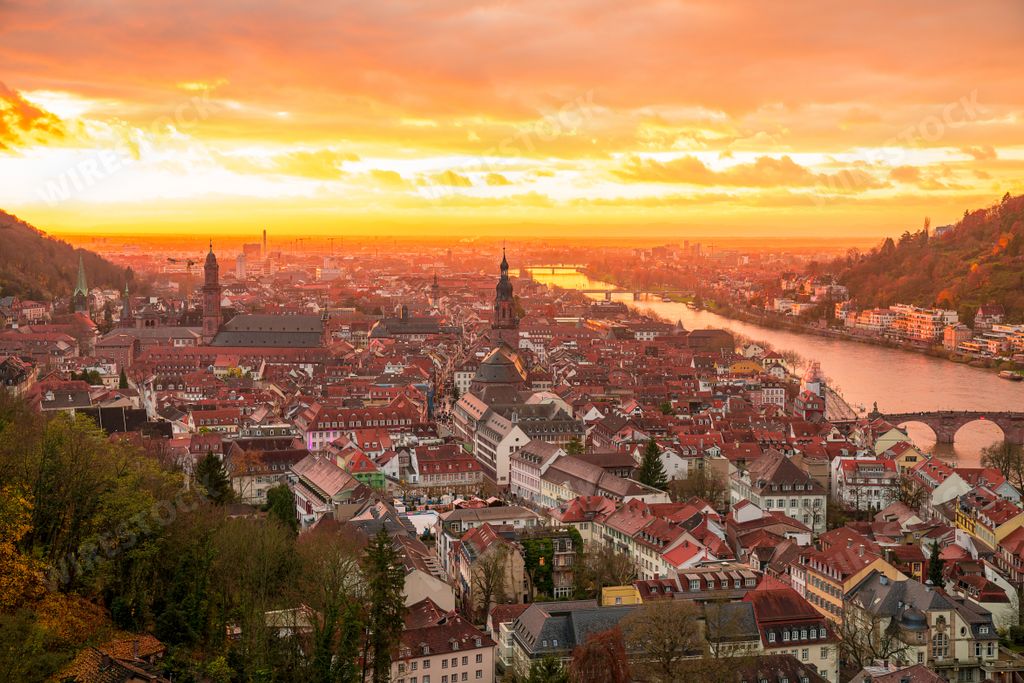 An aerial view of the beautiful Heidelberg, Germany at the fiery sunset