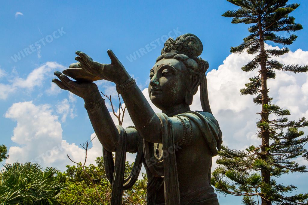 A view of Buddhist statues praising and making offerings to the Tian Tan Buddha in Hong Kong