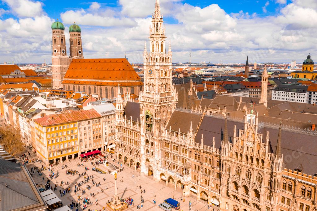 The Marienplatz and Frauenkirche surrounded by buildings under the sunlight in Munich, Germany