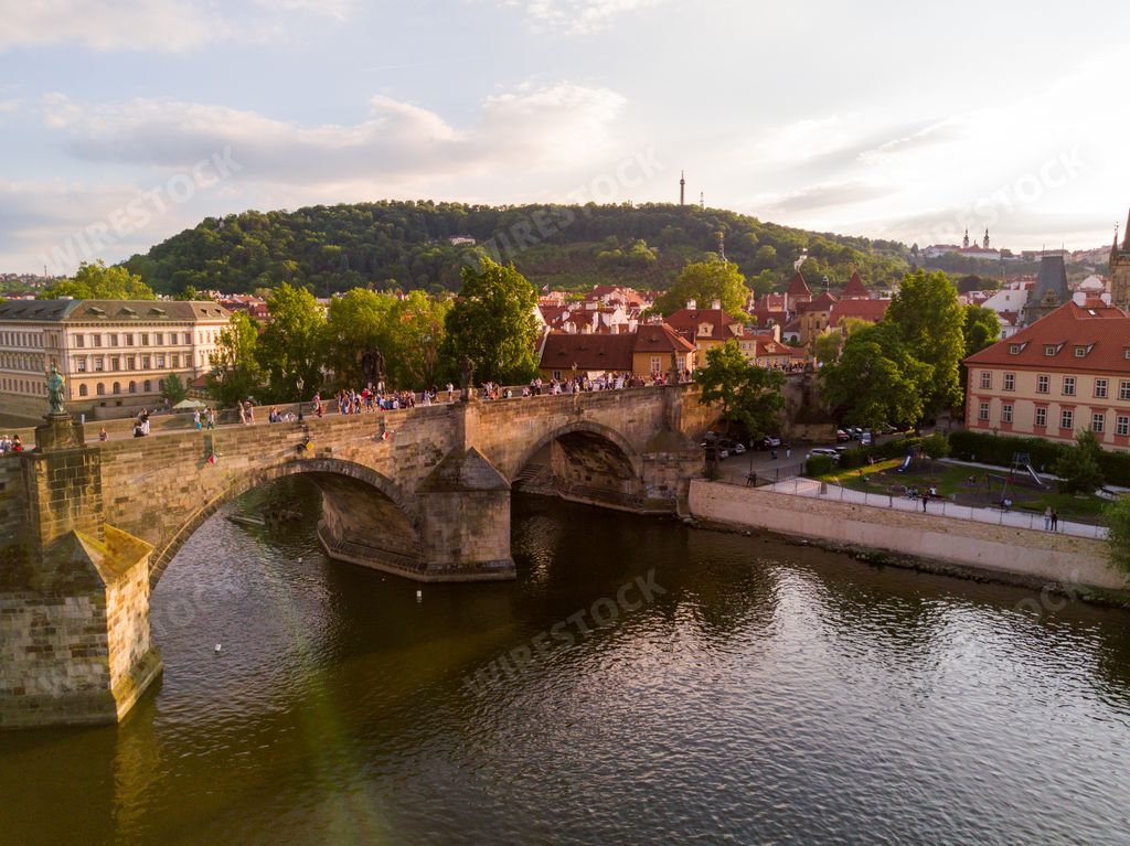 The Charles Bridge over the Vltava river under the sunlight in Prague, the Czech Republic