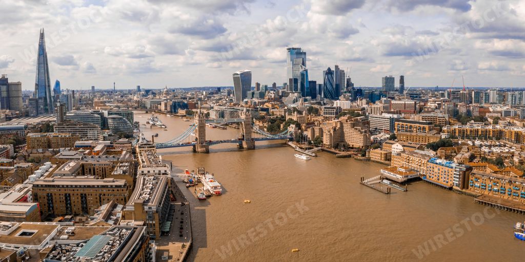 An aerial shot of the Thames River in London, United Kingdom