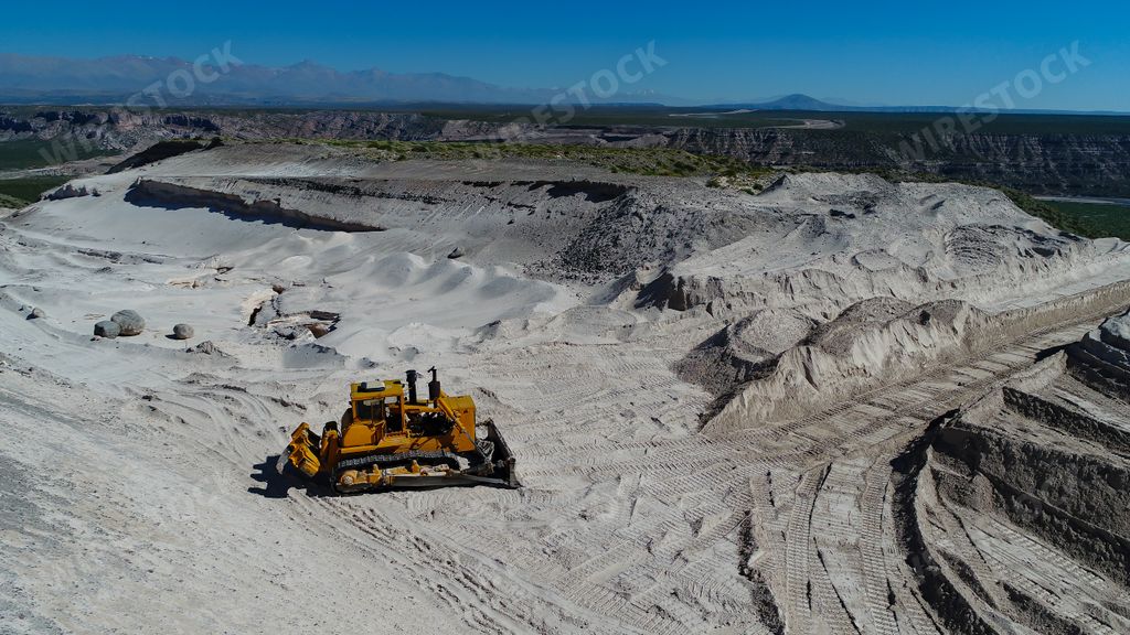 An aerial view of a bulldozer on the construction site