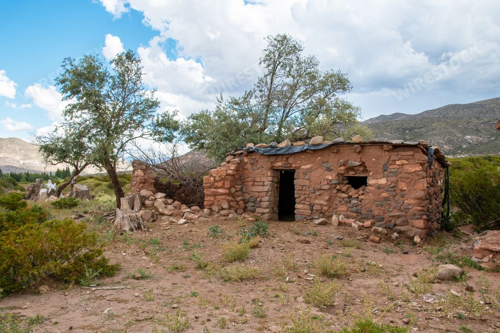 An ancient stone and clay house of the Argentine country Gaucho