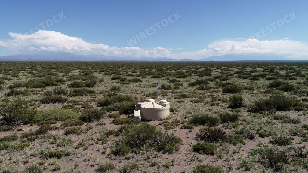 A high angle shot of the detector with solar panel and antenna of the Pierre Auger observatory