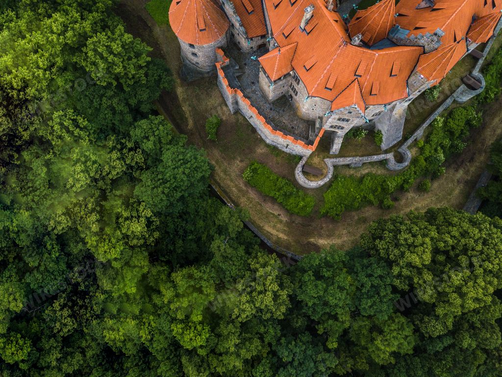An aerial view of a medieval castle on the hill in the Czech region of Moravia