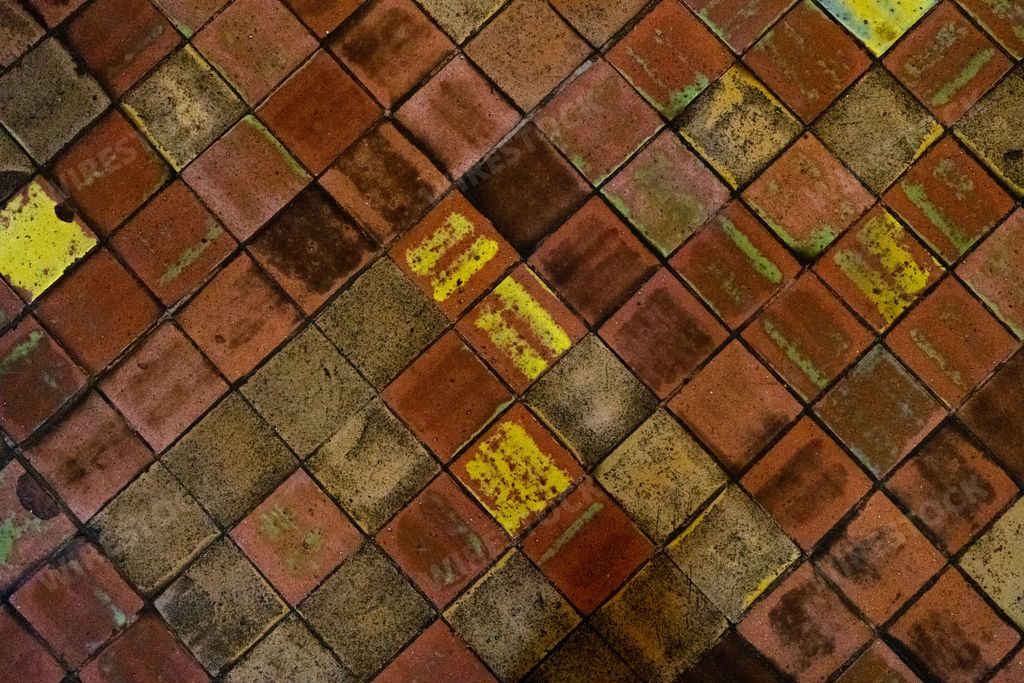 A closeup shot of a medieval tile ground texture