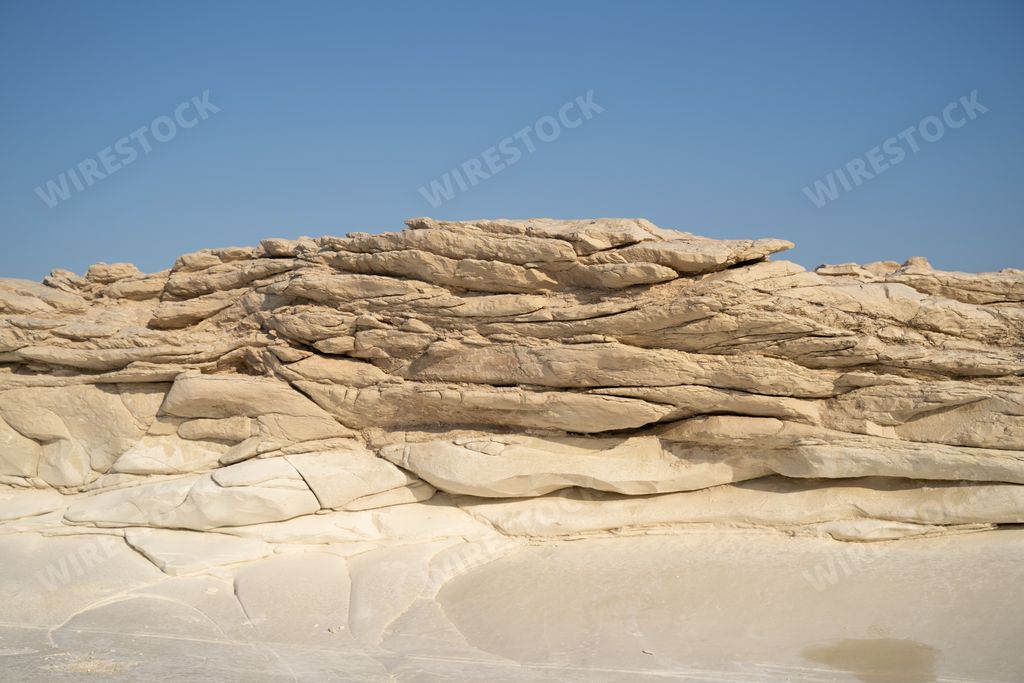 A beautiful shot of marble rock formations under the blue sky