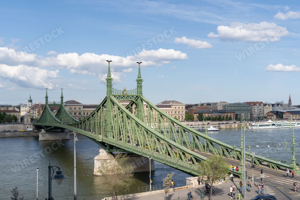 A stunning view of the Liberty Bridge and the Danube river on a sunny day in Budapest, Hungary
