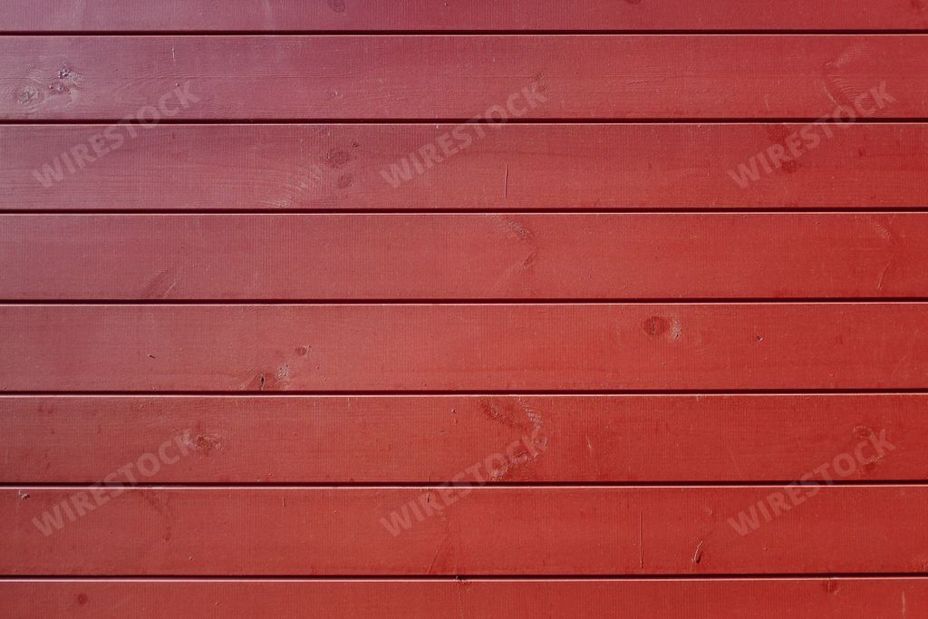 A weathered red plank wood surface - great for background or wallpaper