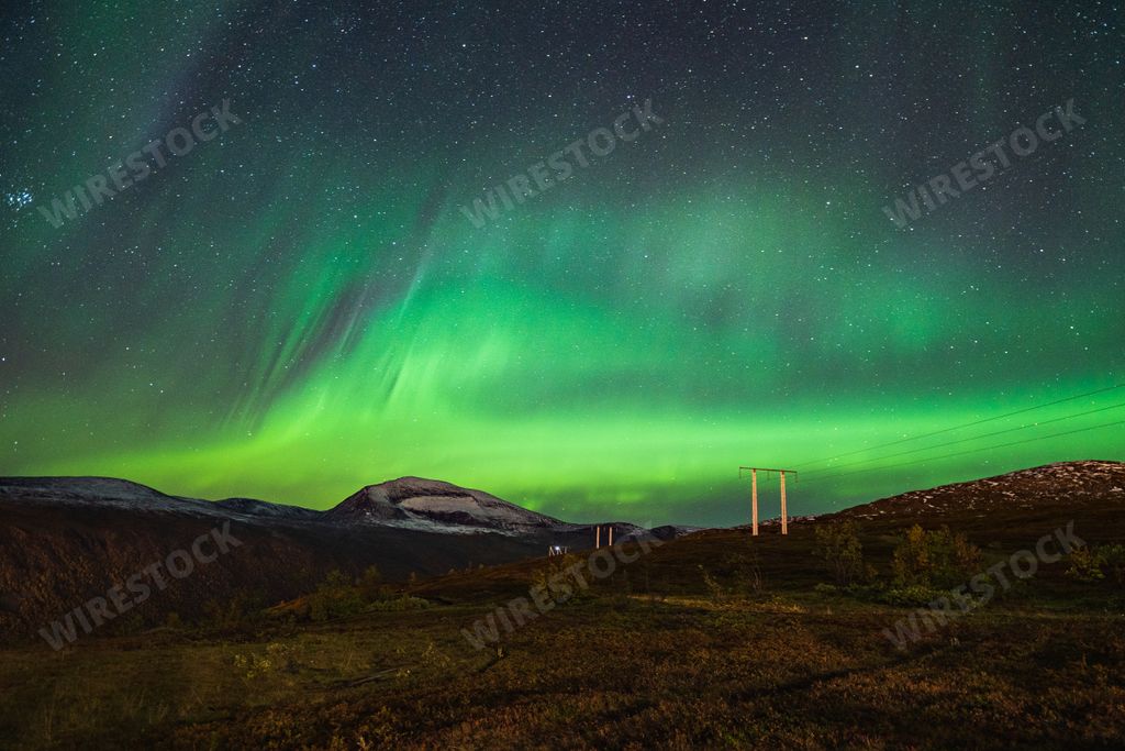 A beautiful scenery of Aurora borealis in the night sky of Tromso Lofoten Islands, Norway