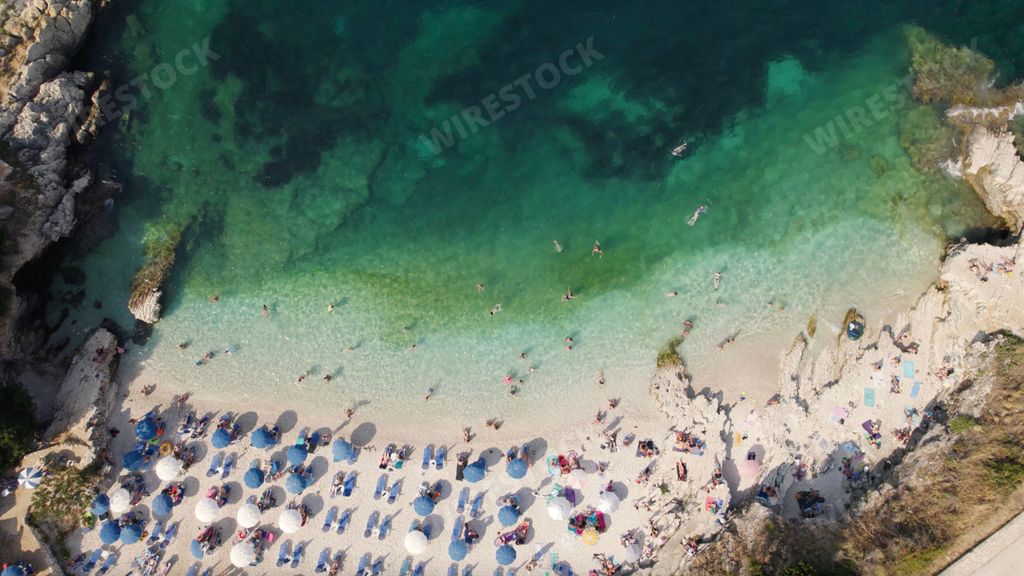 A view of busy Bataria beach from above, Kassiopi, Corfu, Greece