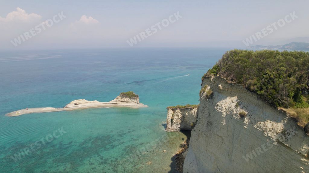 Charming blue sea and Sidari shoreline seen from the air, Corfu, Greece